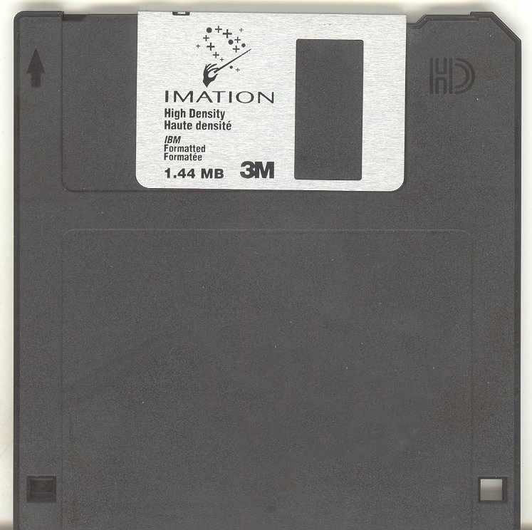 An Imation 3.5-inch high-density floppy disk labelled 1.44 MB