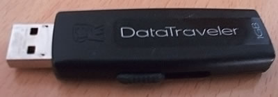 USB flash drive labelled with a capacity of 1 GB