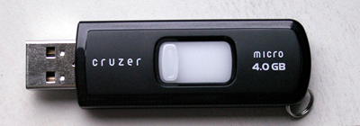 USB flash drive labelled with a capacity of 4 GB